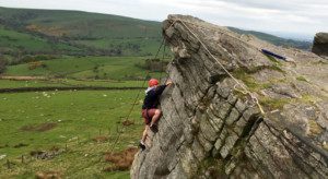 A Stag Group rock climbing Peak District