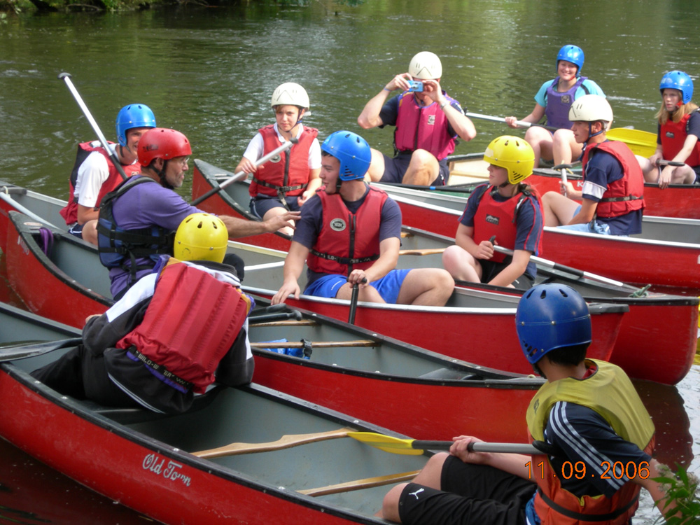 A Group Canoeing on Cromford canal in the Peak District